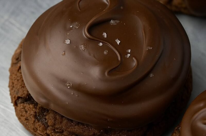 Buckeye Cookie topped with chocolate ganache and coarse sea salt